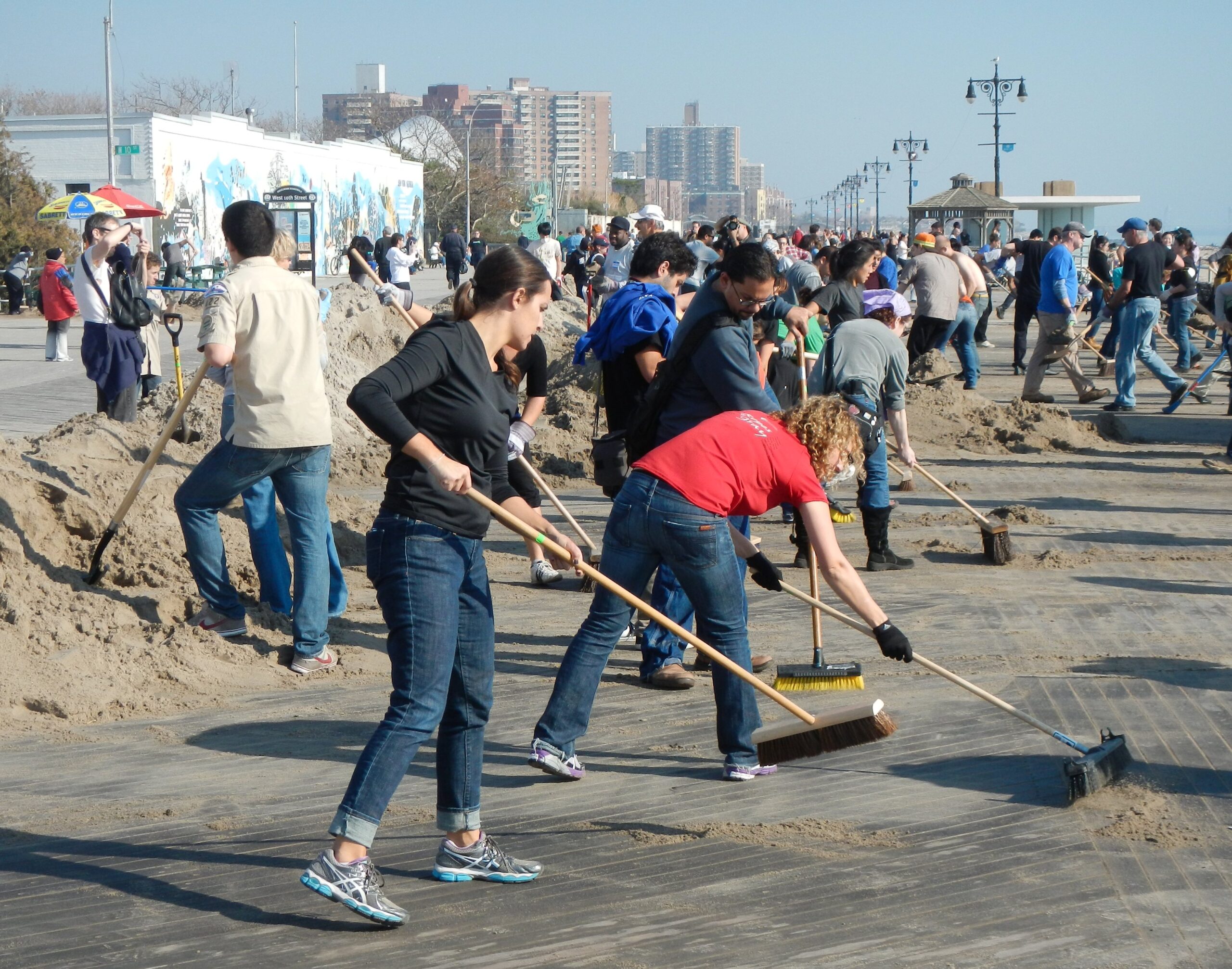 A group of people cleaning up a community (Junction City Council)
